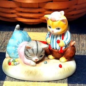 Kitty Cucumber & J. P. Buster Play Marbles